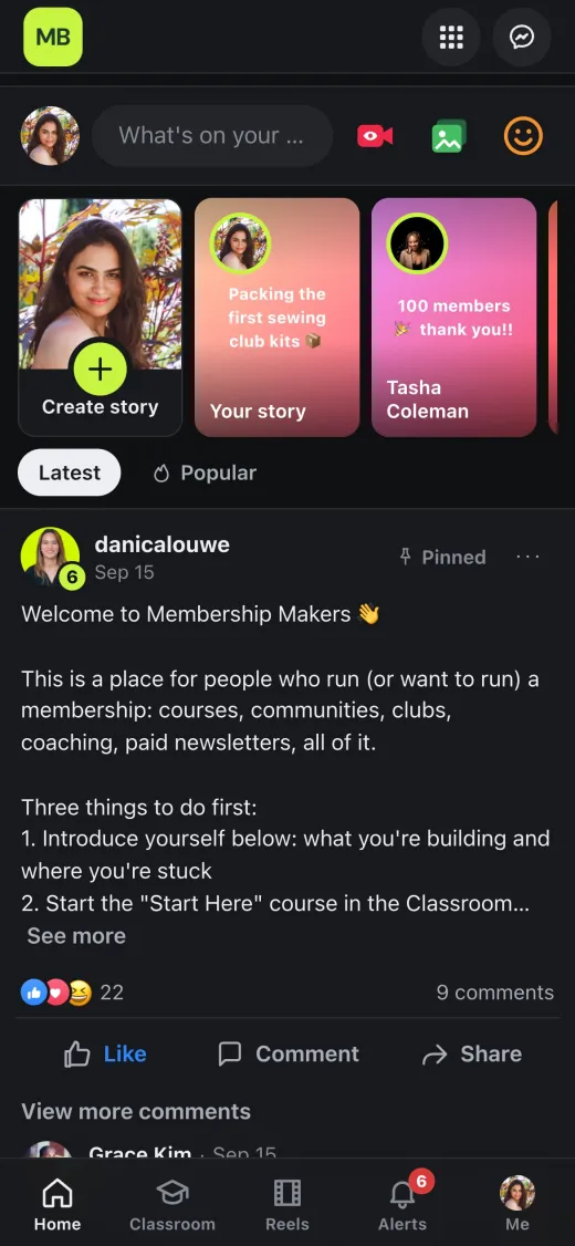 The community feed in dark mode on a phone
